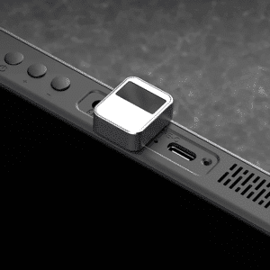 Image showing the AYANEO Hola Fingerprint Scanner plugged into an AYA NEO 2021