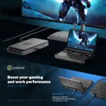 GPD WIN Mini 2024 connected to external GPU eGPU and large monitor Compact clamshell device displays futuristic armored character on its 7 screen eGPU unit enhances graphics performance Large monitor shows expanded game view Setup demonstrates versatility   from portable gaming to desktop class performance Text highlights Boost your gaming and work performance with an eGPU Features USB 4 ports with 40Gbps speeds compatible with accessories and docking stations Note GPD G1 eGPU sold separately