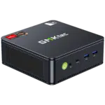 The image showcases the GMKTEC NUBOX M6 Mini PC a compact computing device designed for versatility and efficiency With a sleek matte black finish it exudes a modern aesthetic Its compact form factor makes it suitable for various computing needs The GMKTEC logo is subtly displayed on the device maintaining a minimalist design
