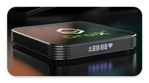 DroiX X4 Android TV Box sobre una mesa. Una muestra de lo elegantes, compactos e integrales que se han vuelto los TV Box.