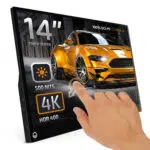 DROIXPM14TLISTINGDONENEW01 DROIX Global DroiX 14 inch touchscreen portable monitor displaying a 4K image of a yellow sports car Text overlay highlights features 14 Touch Screen 500 NITS brightness 4K resolution and HDR 400 support A hand is shown interacting with the touchscreen