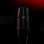 Rear exhaust port of the AYANEO AG01 Graphics Dock with a central screw mount set against a dramatic red and black background