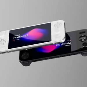 Two AYANEO Pocket S2 handheld gaming consoles, one white and one black, are shown floating or angled against a plain grey background. The white console is on top, slightly to the left, displaying "AYANEO Pocket S2" on its screen with a colorful abstract background. The black console is beneath it, angled similarly, with its screen also showing "AYANEO Pocket S2" but partially obscured.