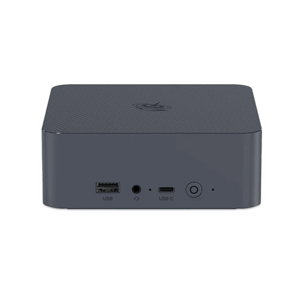 BEELINKEQR6LISTINGDONE01 DROIX Global A straight on front view of a dark grey square shaped mini PC with rounded corners set against a solid dark green background The top surface has a subtle textured pattern and a circular logo The front panel features a USB A port a headphone jack a USB C port and a power button with a circular LED indicator All ports and buttons are labeled with white text