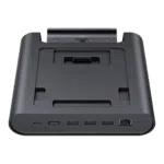 A three quarter frontal view of a black GPD WIN 5 docking station isolated against a black background The dock features an array of ports on the front edge including USB C USB A and an RJ45 Ethernet port The recessed top area is designed to hold the GPD WIN 5 and includes a connector for charging and data