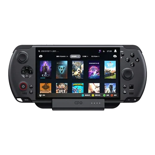 A front-on view of a black handheld gaming console (likely a GPD WIN model) with an attached magnetic/pogo pin dock at the bottom. The screen displays a game library interface featuring titles like Destiny 2, Overwatch 2, and Brawlhalla. The console has an analog stick, D-pad, and power button on the left, and face buttons and an analog stick on the right.